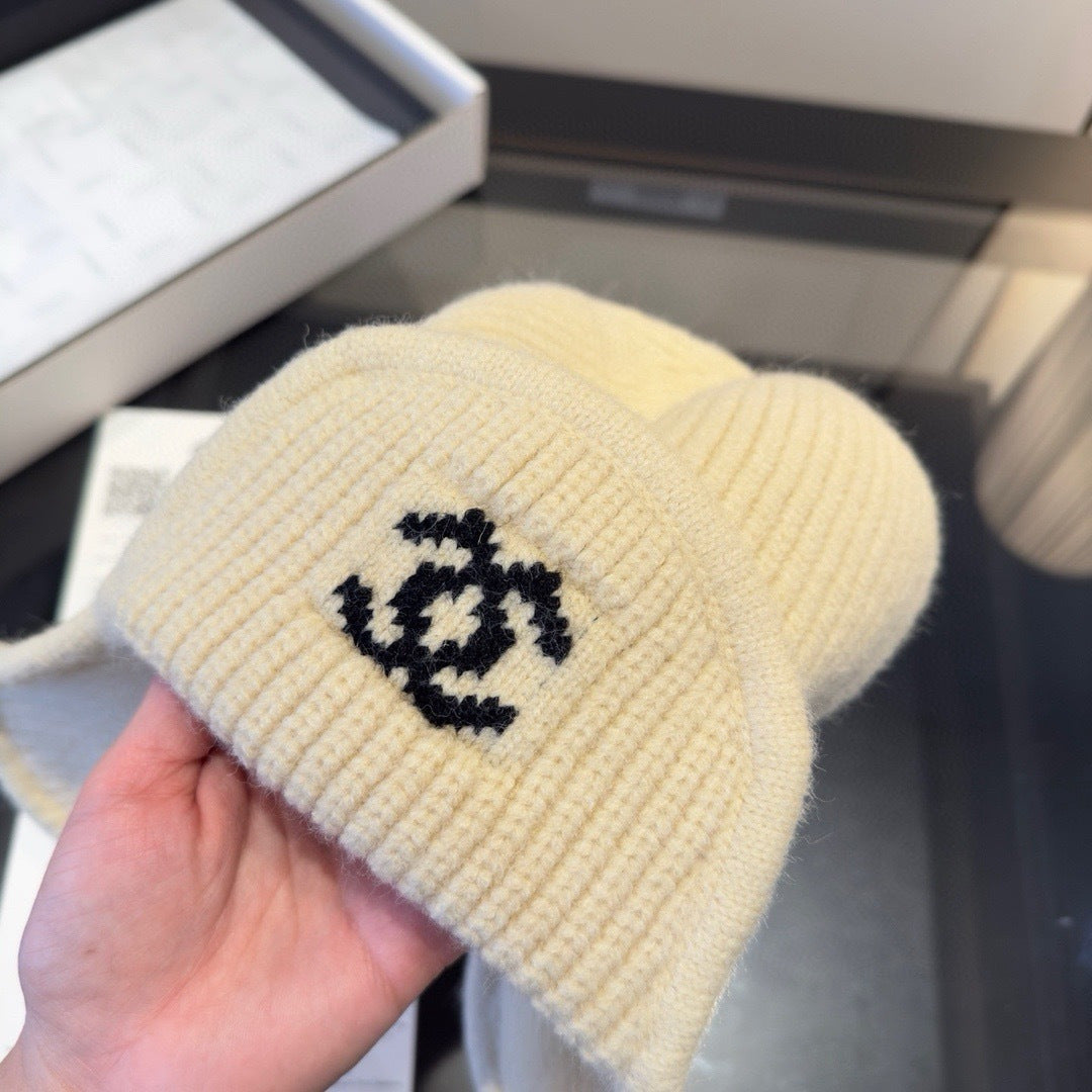 Chanel Knitted Beanie Earflap Cap Cream Fibrous 980284