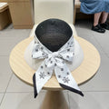 Chanel Straw White Black Hat with a White Silk Ribbon 192276