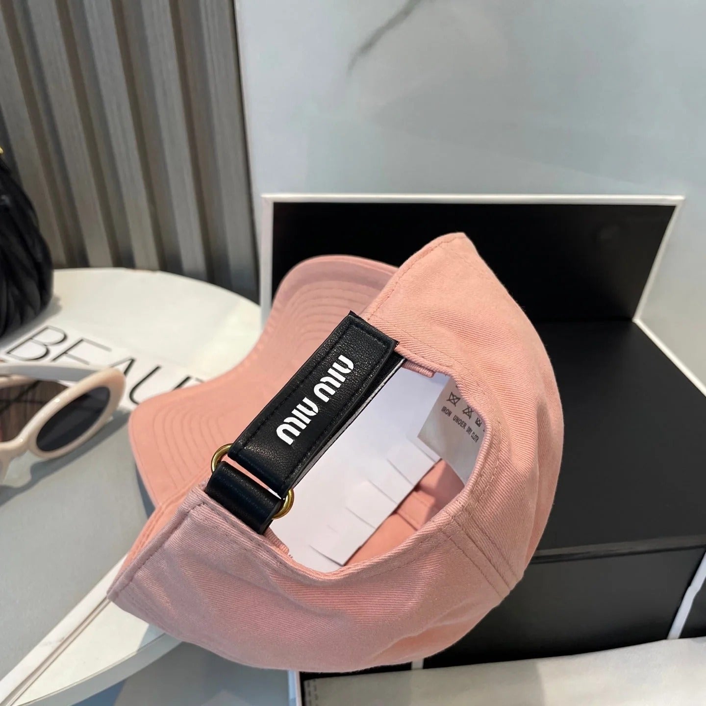 MM BASEBALL CAP IN PEACHY PINK FABRIC BRAND EMBROIDERY