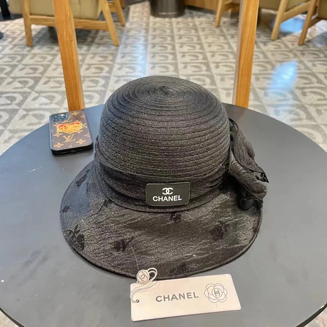 STRAW HAT WITH CHIFFON FLOWER BLACK 672760