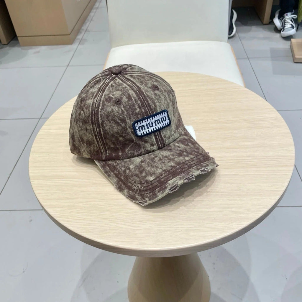 MM DISTRESSED FABRIC BASEBALL CAP IN BROWN WITH EMBROIDERED LOGO