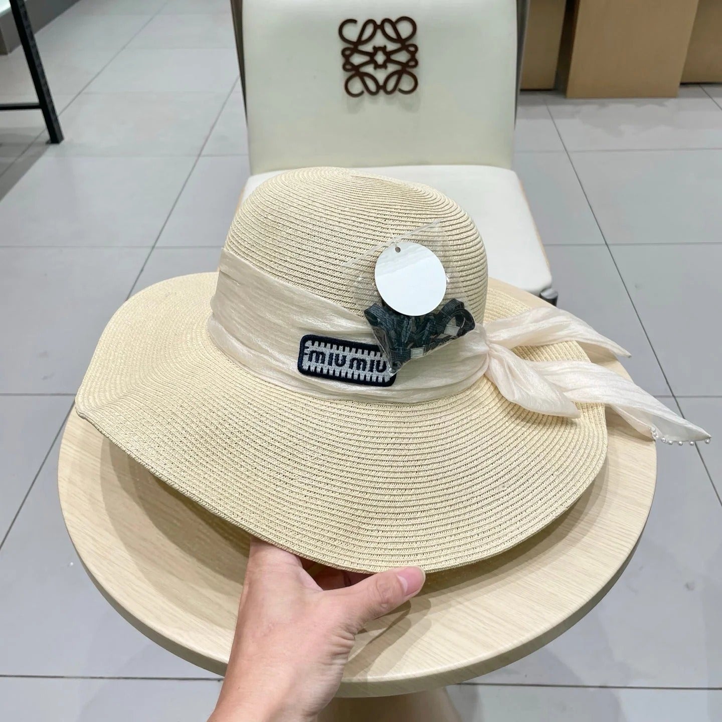 MM WIDE-BRIM BEACH HAT IN LIGHT BEIGE WITH FABRIC BOW