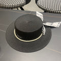 MM SMALL-BRIM STRAW HAT IN BLACK AND PEARL EMBELLISHED